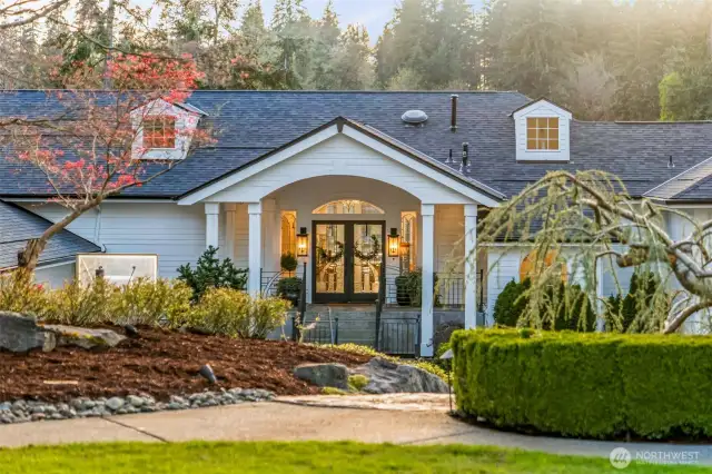 The double doors welcome you into this home that is both expansive and inviting