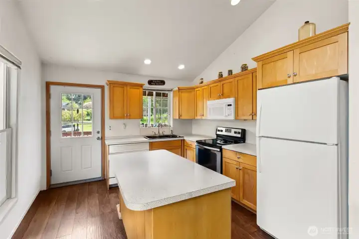 Convenient kitchen in the ADU.   Door goes to the stairs down to the main level.