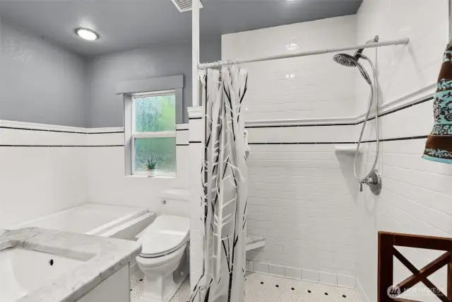 Master shower is tiled,  multi-function bidet