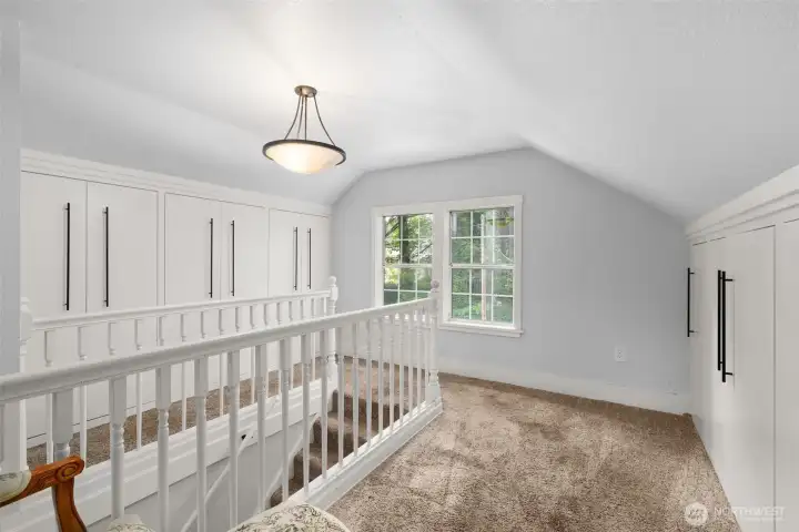 Landing at top of the stairs.  Note the closets on both sides.