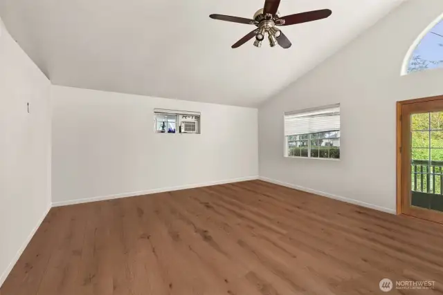 Living room in the ADU.  Door at right leads to the elevated deck.