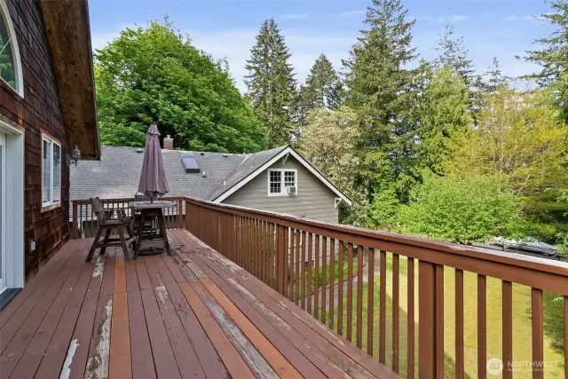 Deck at the ADU accessed from the kitchen and living room.   Main house and front yard beyond.