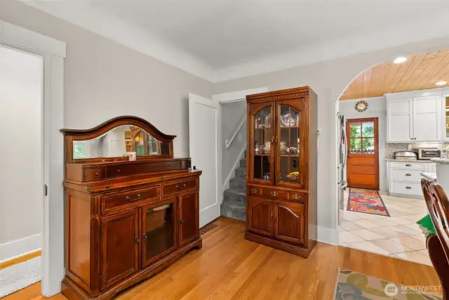 Adjacent to the dining area are the stairs to upper level.