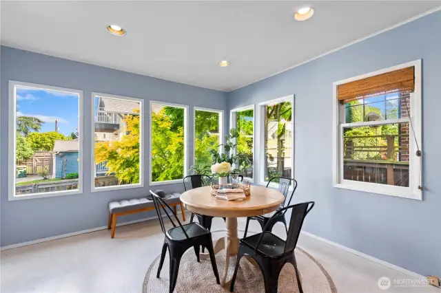 Casual eat-in kitchen where you can enjoy coffee and maybe even get a glimpse of eagles nesting.