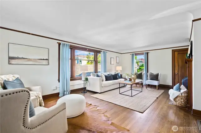 Gleaming hardwoods, beautiful millwork and period details greet you!
