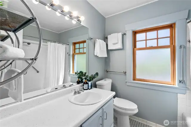 Full bathroom upstairs with lots of counter space and storage.