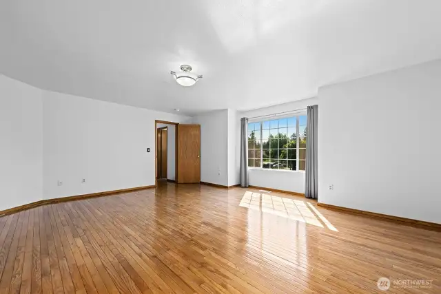 Large upper floor bonus room makes a terrific office, gym, game room or play room.