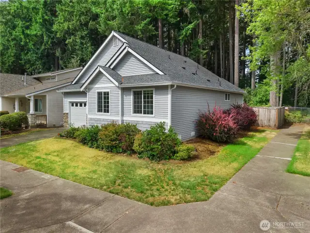 Privately located on a corner lot with stub road to the right.