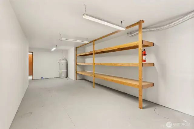 Lower level storage showing one of two hot water tanks