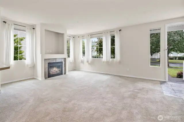 Come on in! Light and bright living space with an abundance of windows.
