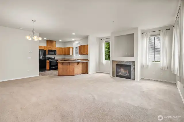 Gas fireplace brings winter warmth and ambiance to the open concept floor plan.