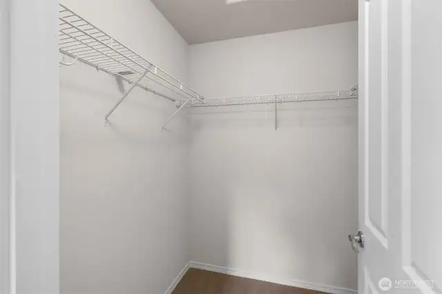 Walk-in closet in the Primary Suite.