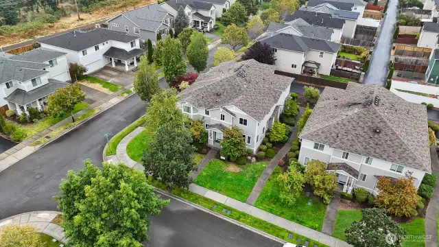 Tucked away on a corner lot with alleyway access to the rear parking.
