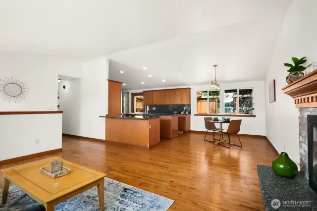 Open concept living space to kitchen