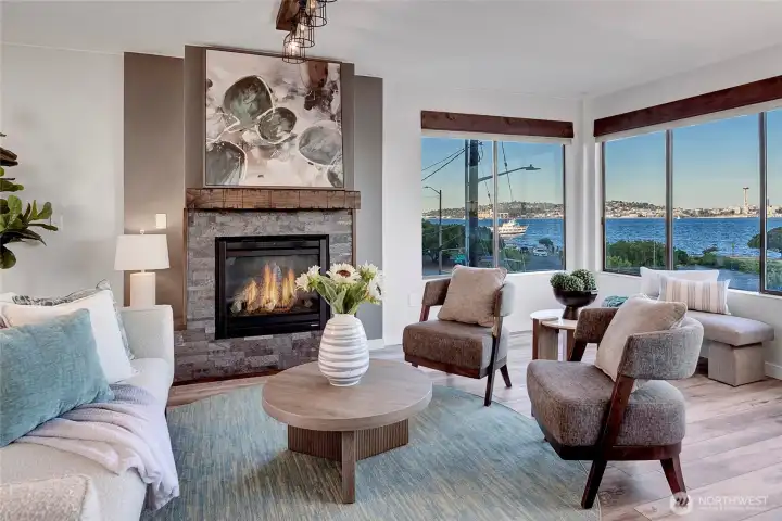 Gas fireplace with stone surround and wood mantle
