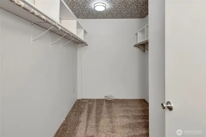 Large walk-in closet in primary bedroom