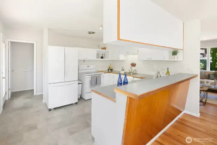 Open kitchen with new flooring.
