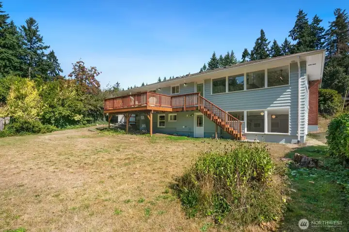 Large open yard has room to run and play.