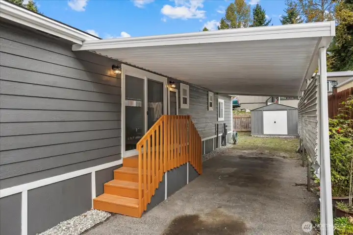 Deep carport big enough for 3 cars and Storage Shed