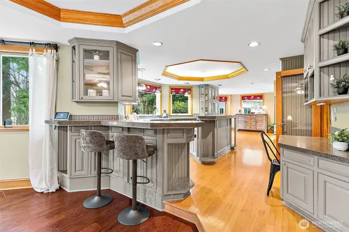 Kitchen with island bar for extra sitting space.