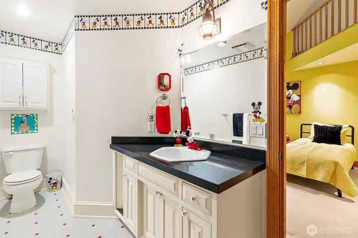 En-suite bathroom connected to bedroom.