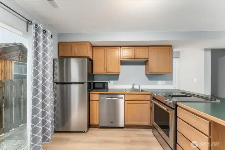 Kitchen with newer appliances.