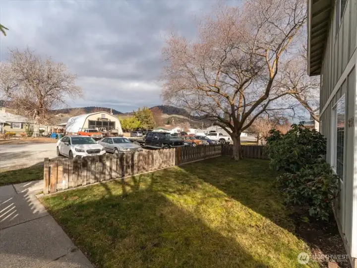 View of spacious landscaped yard.