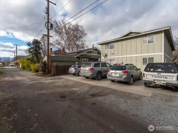 Back of building parking area and alley.