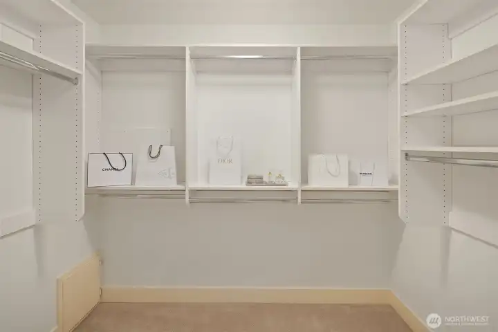 This walk-in closet completes the primary suite.