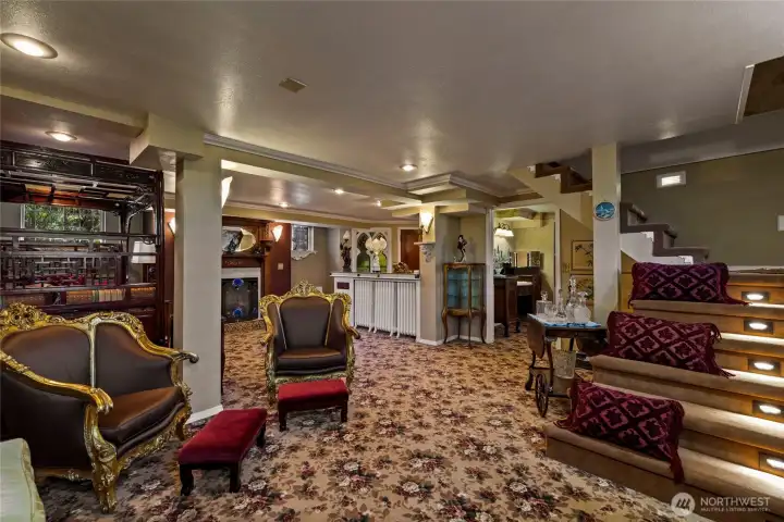 Lower level lives like a private ADU or luxurious guest quarters, with a second kitchen, laundry, fireplace & spa-inspired bathroom.