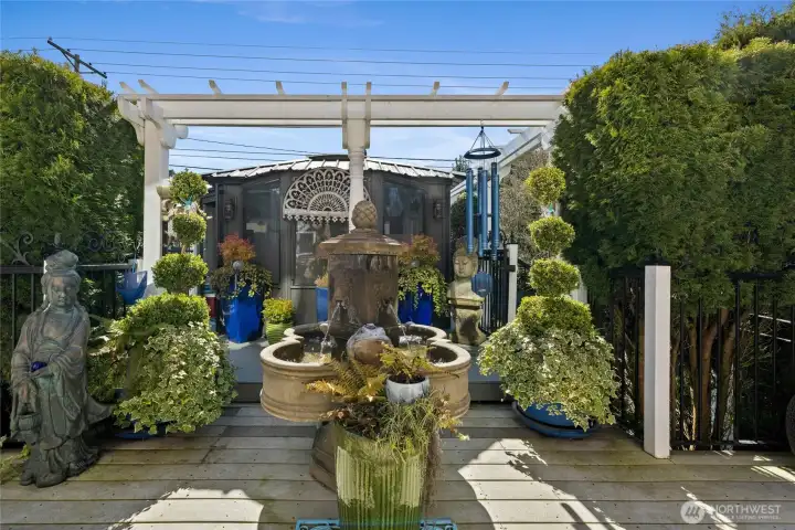 Swim spa enclosure in the rear of picture.