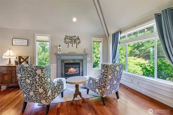 Living room sitting area with cozy foreplace