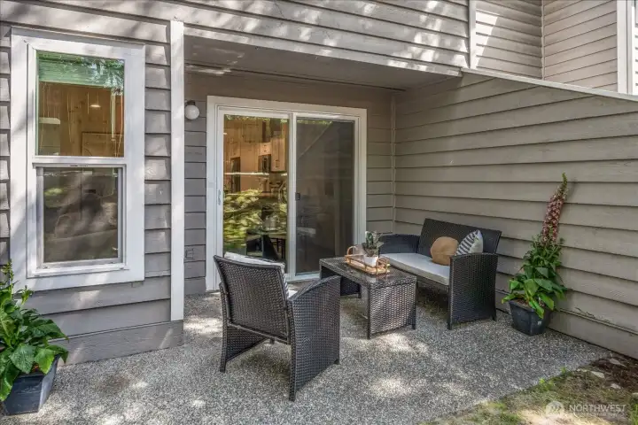 Sheltered and private, this inviting patio creates a comfortable extension of the home’s living space.