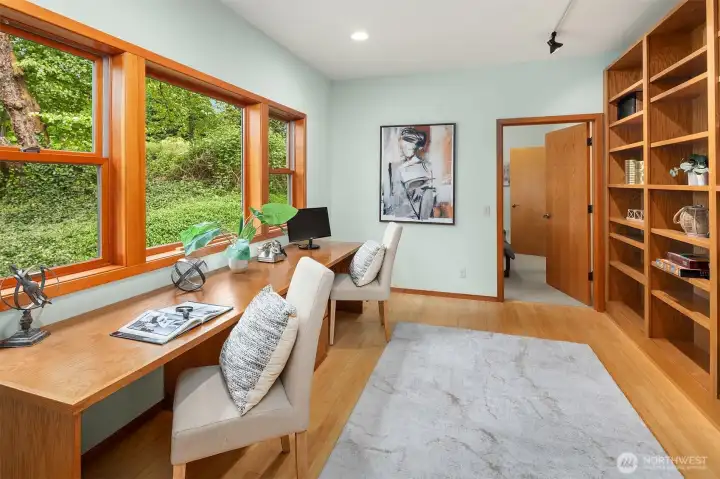 Dedicated 2-person office leading to guest suite. Dedicated 2-person office leading to guest suite.