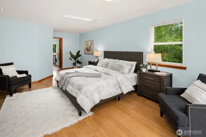 Primary suite features dual walk-in closets, balcony, and 5-piece bath. Primary suite features dual walk-in closets, balcony, and 5-piece bath.