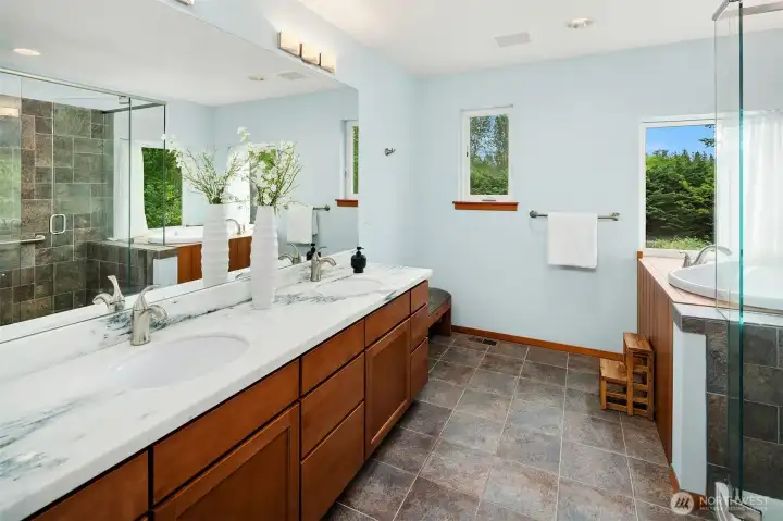 Primary 5-piece bath featuring Japanese-style soaking tub. Primary 5-piece bath featuring Japanese-style soaking tub.