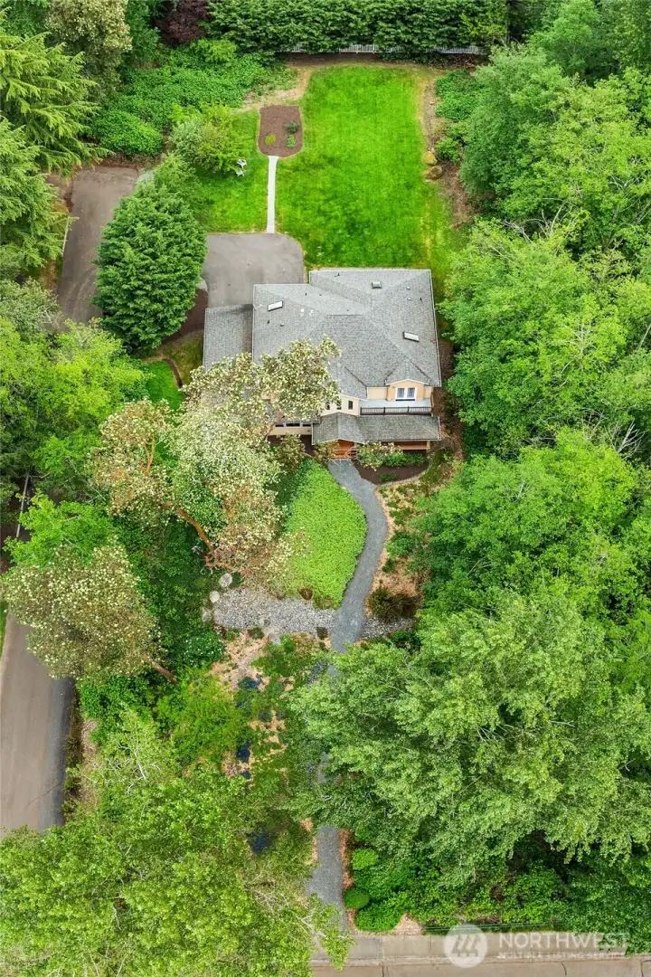 Aerial view of home and lot. Aerial view of home and lot.