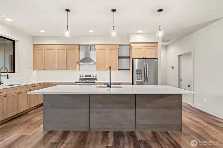 Large island with plenty of space for dining and food prep