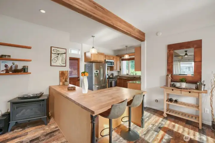 And this is where every fantastic meal you will prepare, cook and eat begins. This eating bar/counter top is mad of butcher's block. And this is where every fantastic meal you will prepare, cook and eat begins. This eating bar/counter top is mad of butcher's block.