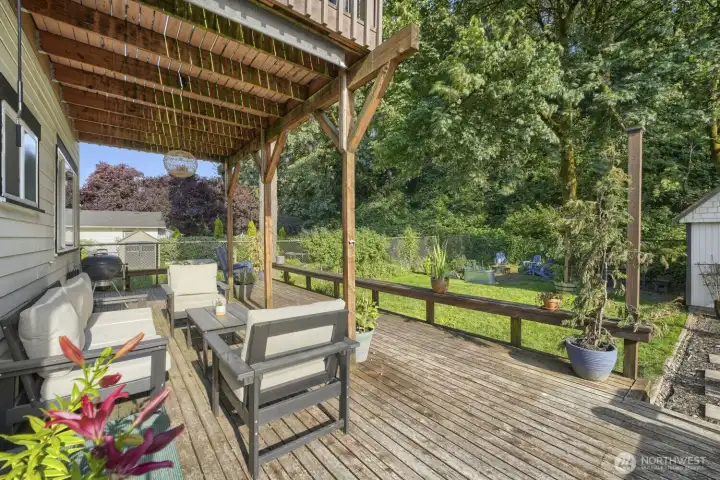 This deck and backyard can host various sizes of celebrations but it can also be that cozy, golden hour space where you wind down at the end of a day. Your morning coffee just got an upgrade ;) This deck and backyard can host various sizes of celebrations but it can also be that cozy, golden hour space where you wind down at the end of a day. Your morning coffee just got an upgrade ;)