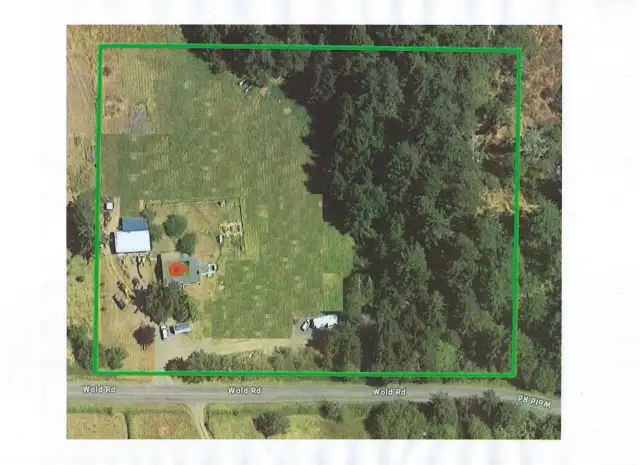 Property outline. RV hookup on west side of property near trees. Has power, water, septic connection for RV.