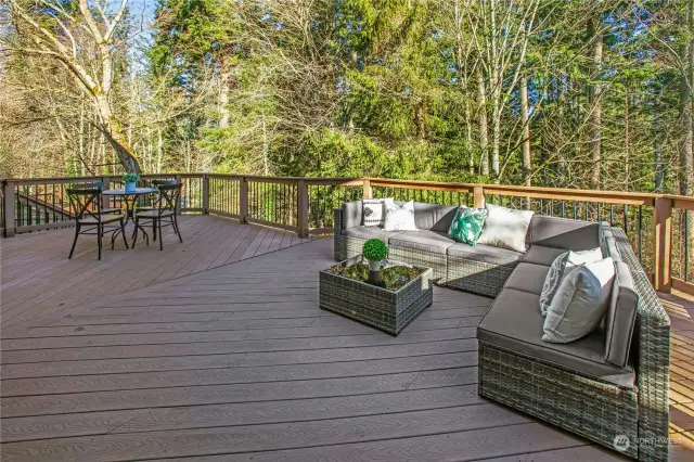 Enjoy ultimate backyard privacy on the expansive, custom composite deck.