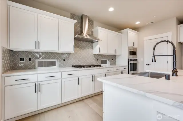 This photo of a different home to show example of appliance package only. Details will vary.