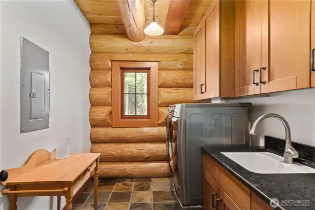 Generous sized laundry room.