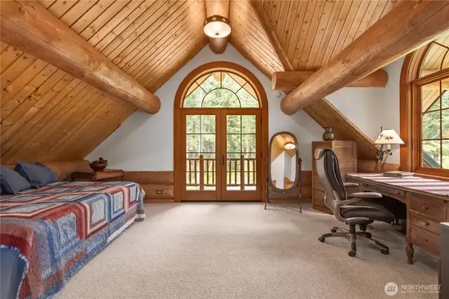 2nd bedroom with private covered balcony.