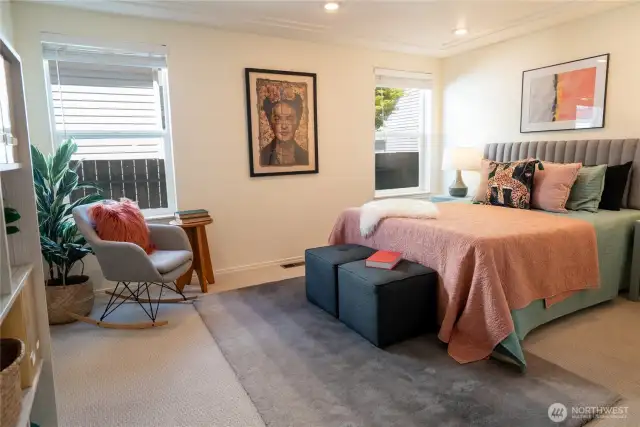 Both bedrooms are large! Twin beds or a bunk bed easily fit in this room, and it has its own bathroom with a shower and a big walk-in closet