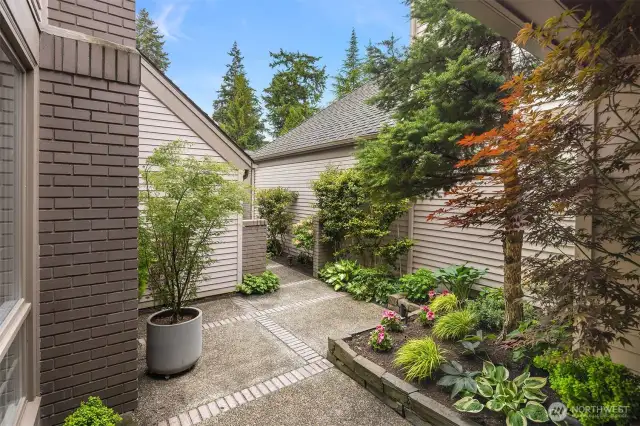 Beautiful lush landscaping and private entry.