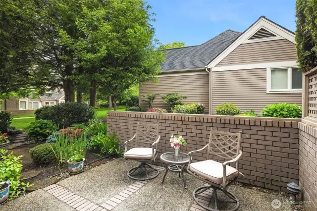 Enjoy your private patio with lush landscaping for morning coffee or al fresco dining.