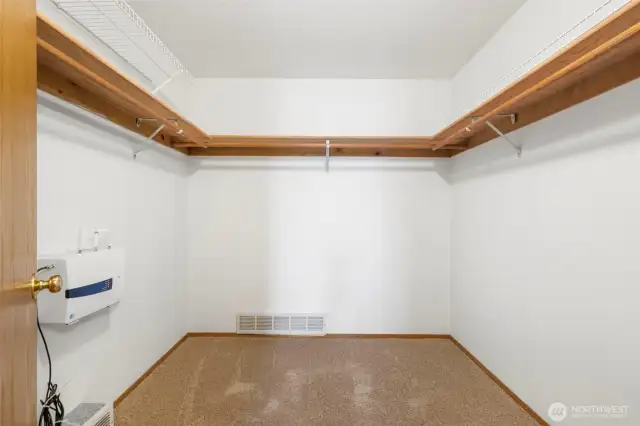 Primary bedroom walk-in closet.