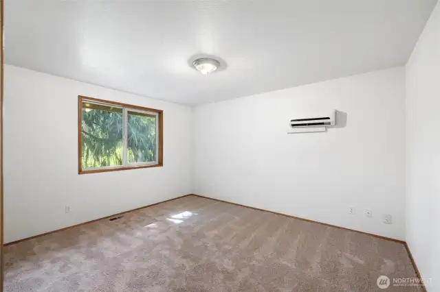 First guest bedroom with double closet.